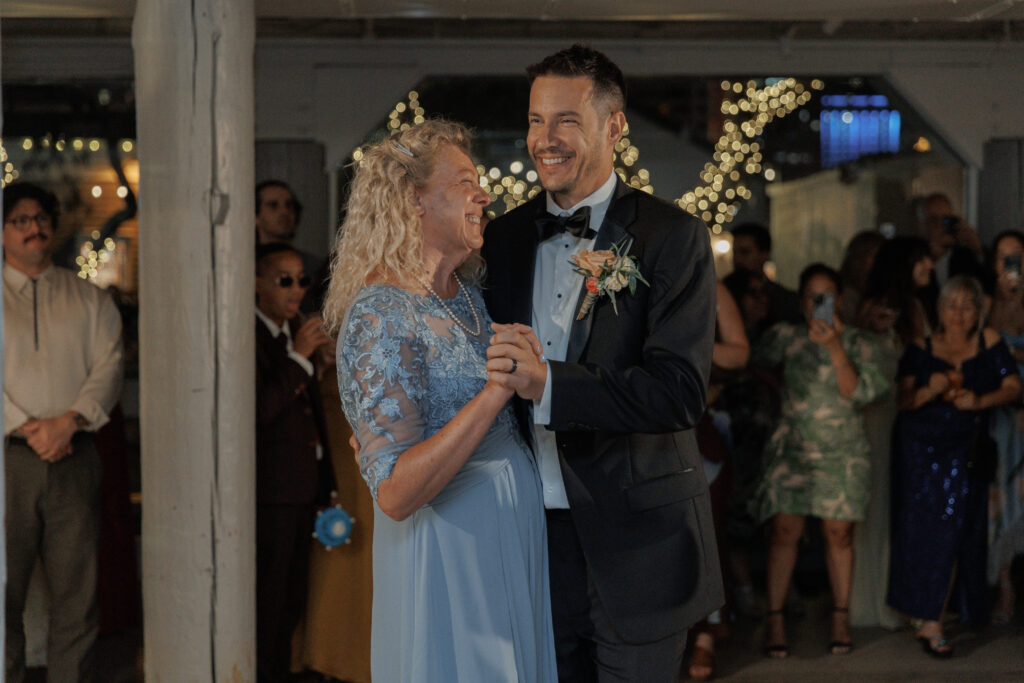 Groom and mother's dance together
