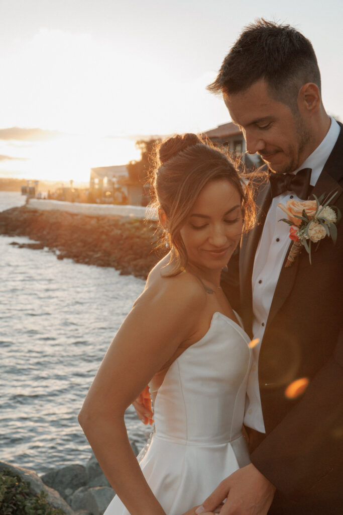 AJ and Janel sharing an intimate moment during golden-hour portraits