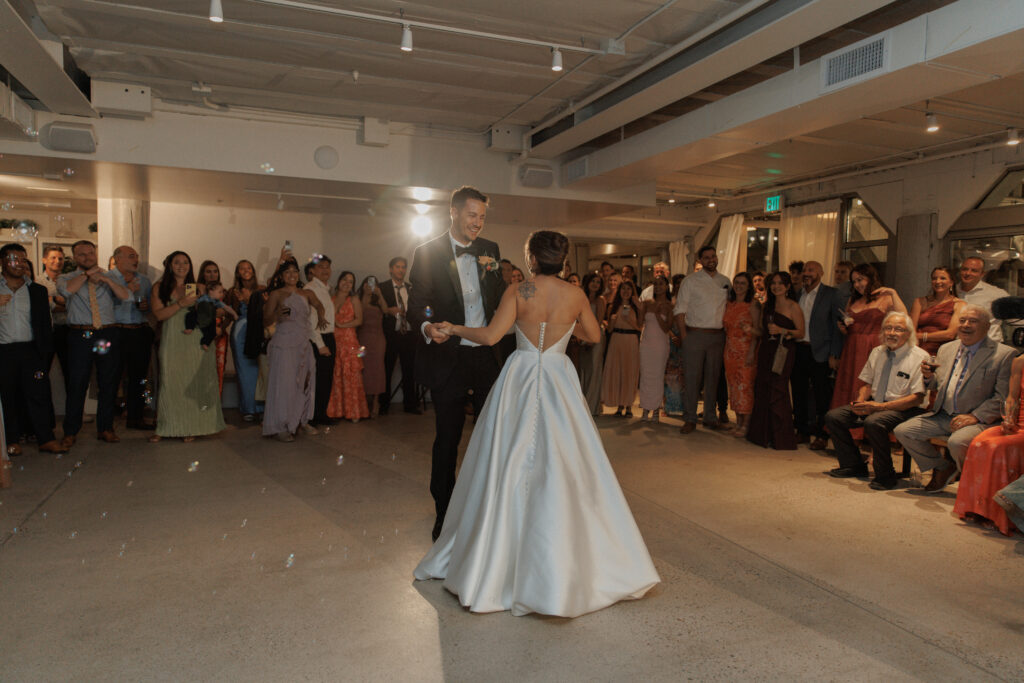 Aj and Janel as newly wed couple's moment in their first dance as married.